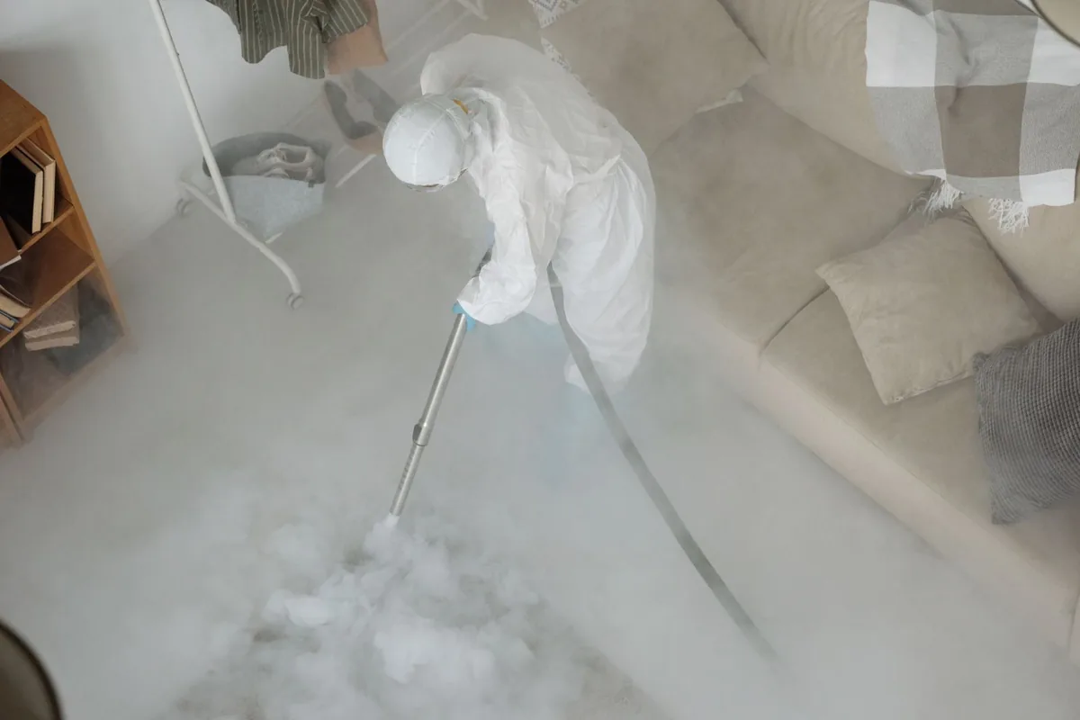 Biohazard cleanup technician in protective equipment, Louisa, VA